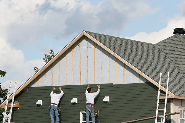 Professional Emergency Siding Repair technician working in West Sayville, NY
